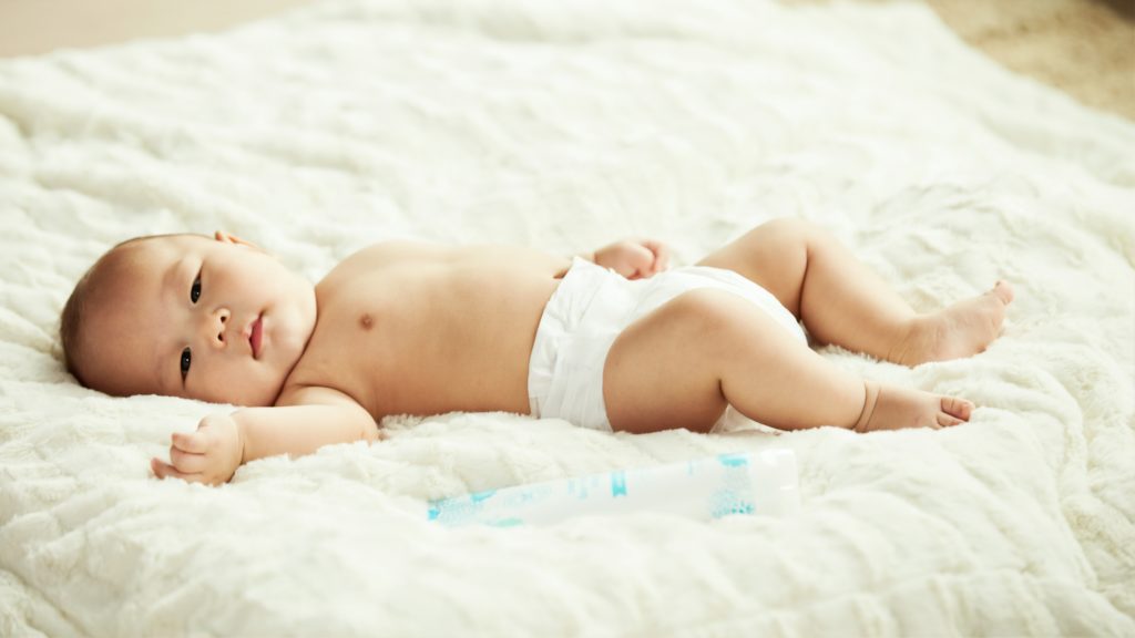 chiro for babies, baby on his back